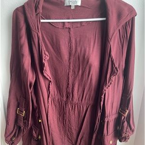 Charlotte Russe light jacket. Maroon with hood and buckles on elbows.